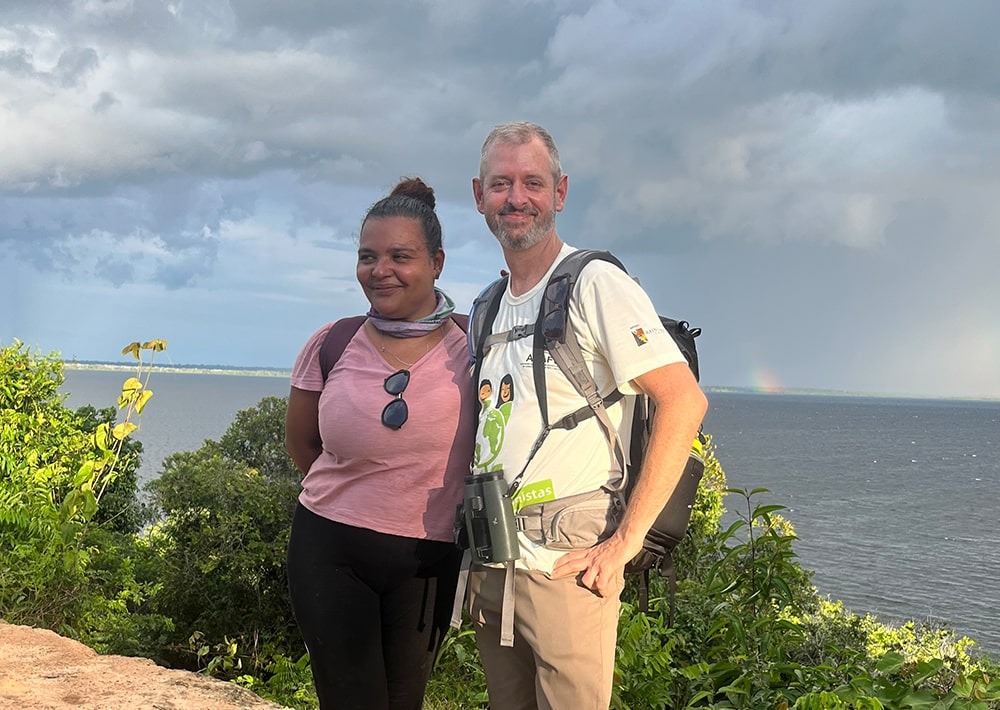 James and Andrea pose for a photo by Lake Tefé in the Brazilian Amazon.